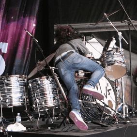 The Midnight Juggernauts topple over the drums!